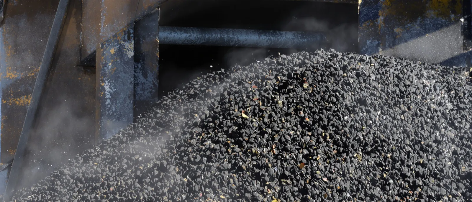 Dump truck on a platform scale at the entrance of an asphalt plant